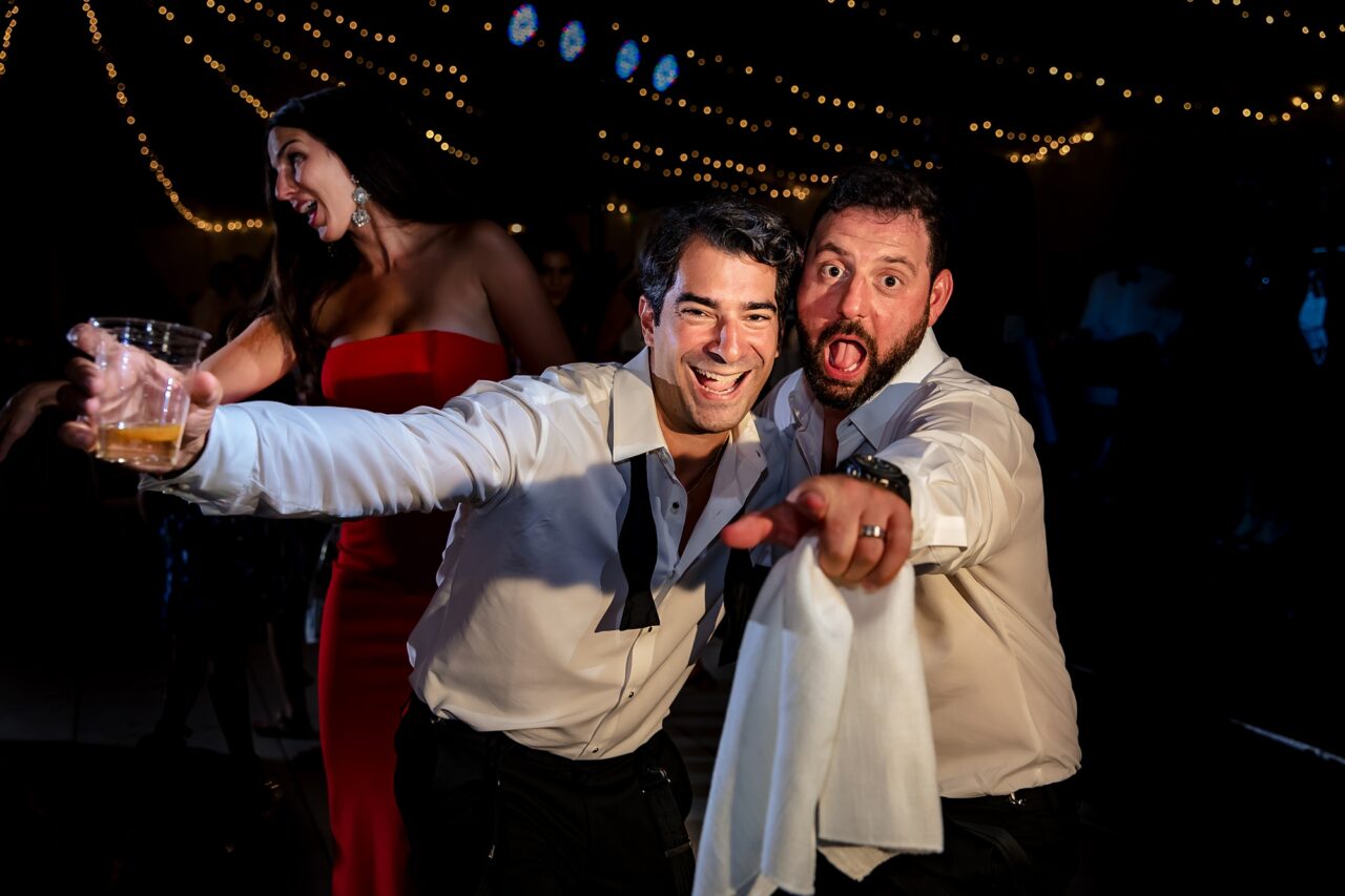 Groom dancing at wedding reception at Bay Harbor Michigan